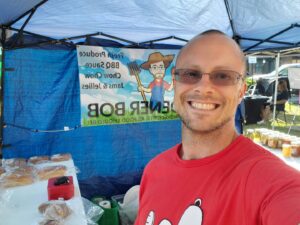 Picture of Bob at one of his stands at a farmer's market